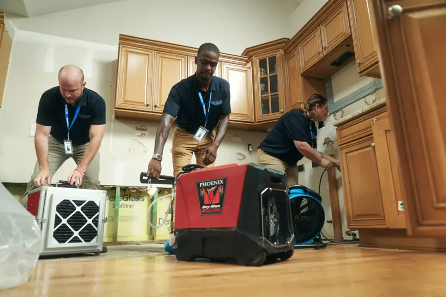 Restoration crew drying a flooded Encino, CA home